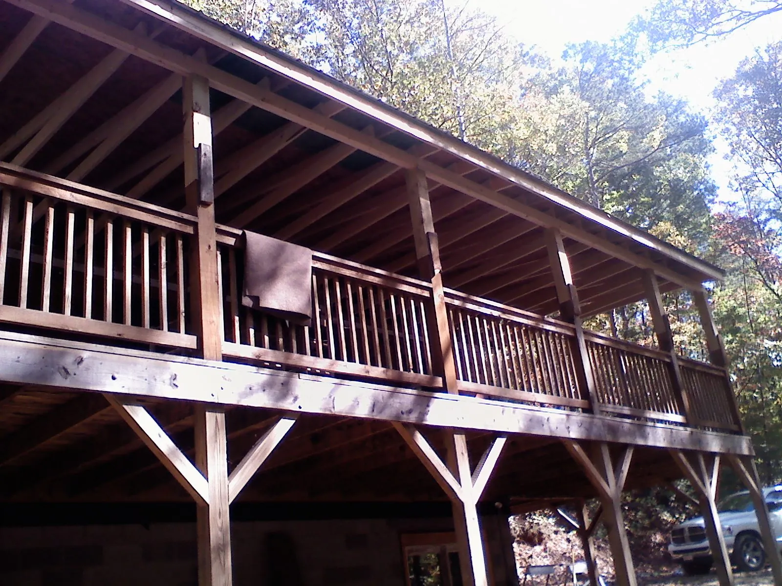 Timber framing under a new elevated porch and deck — Roof Leak Repair in Battle Mountain by Roofing Brothers